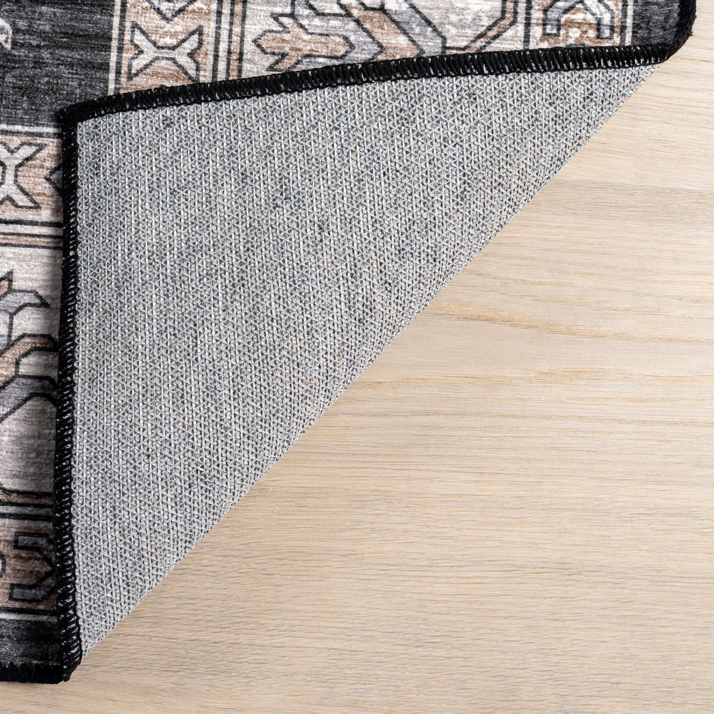 Andrea Bordered Stain Resistant Washable Rug in Charcoal