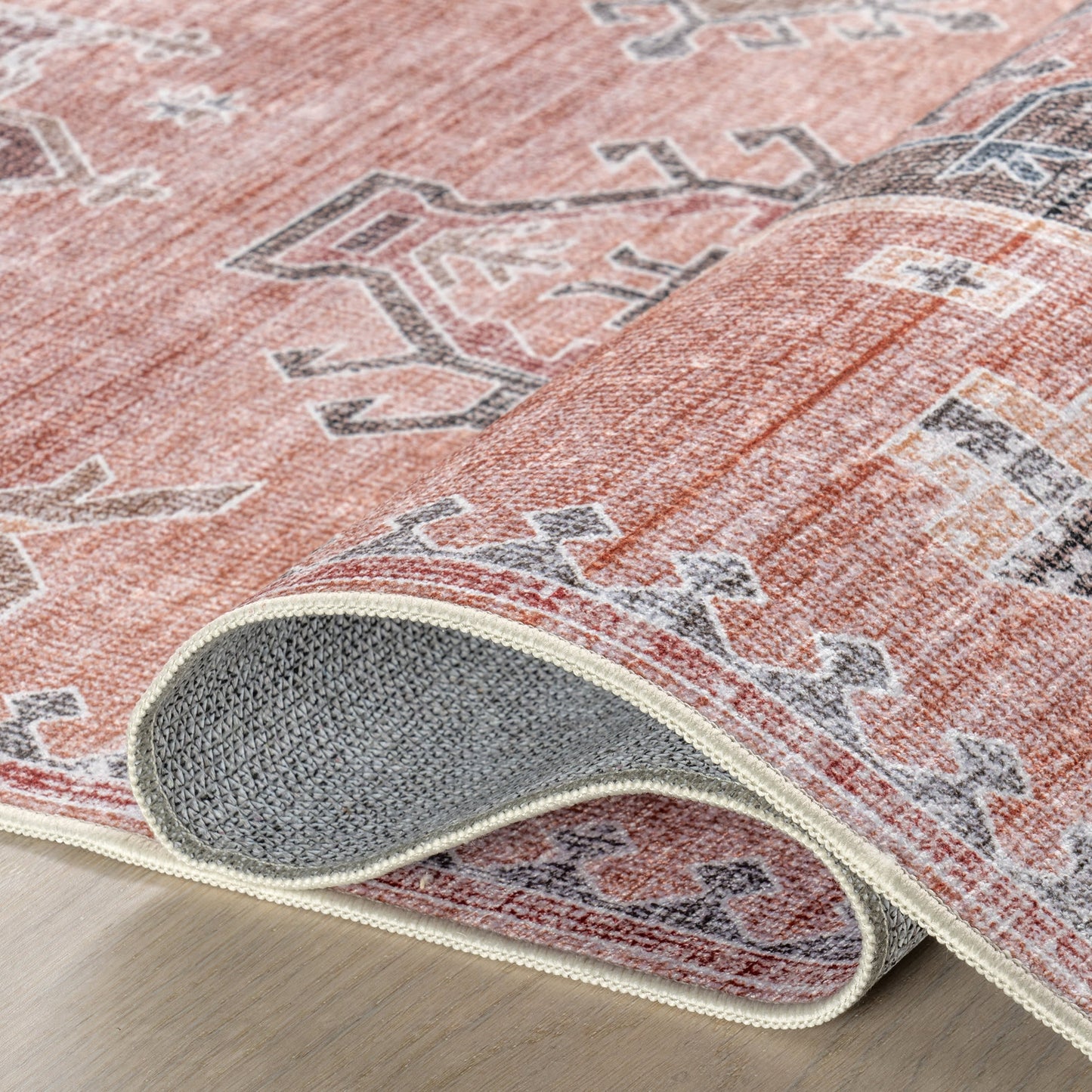 Brenda Hazy Heraldry Spill-Resistant Washable Rug in Pink