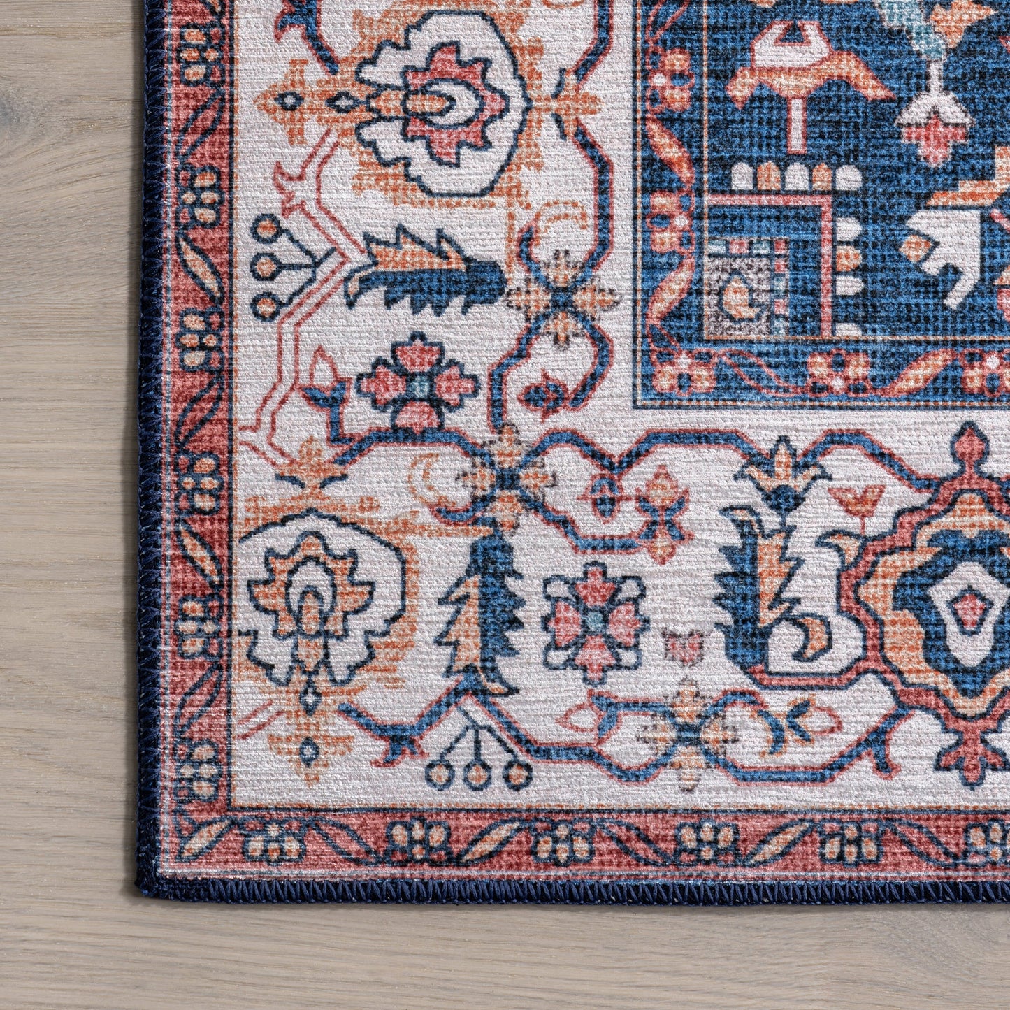 Atrium Medallion Stain-Resistant Washable Rug in Rust