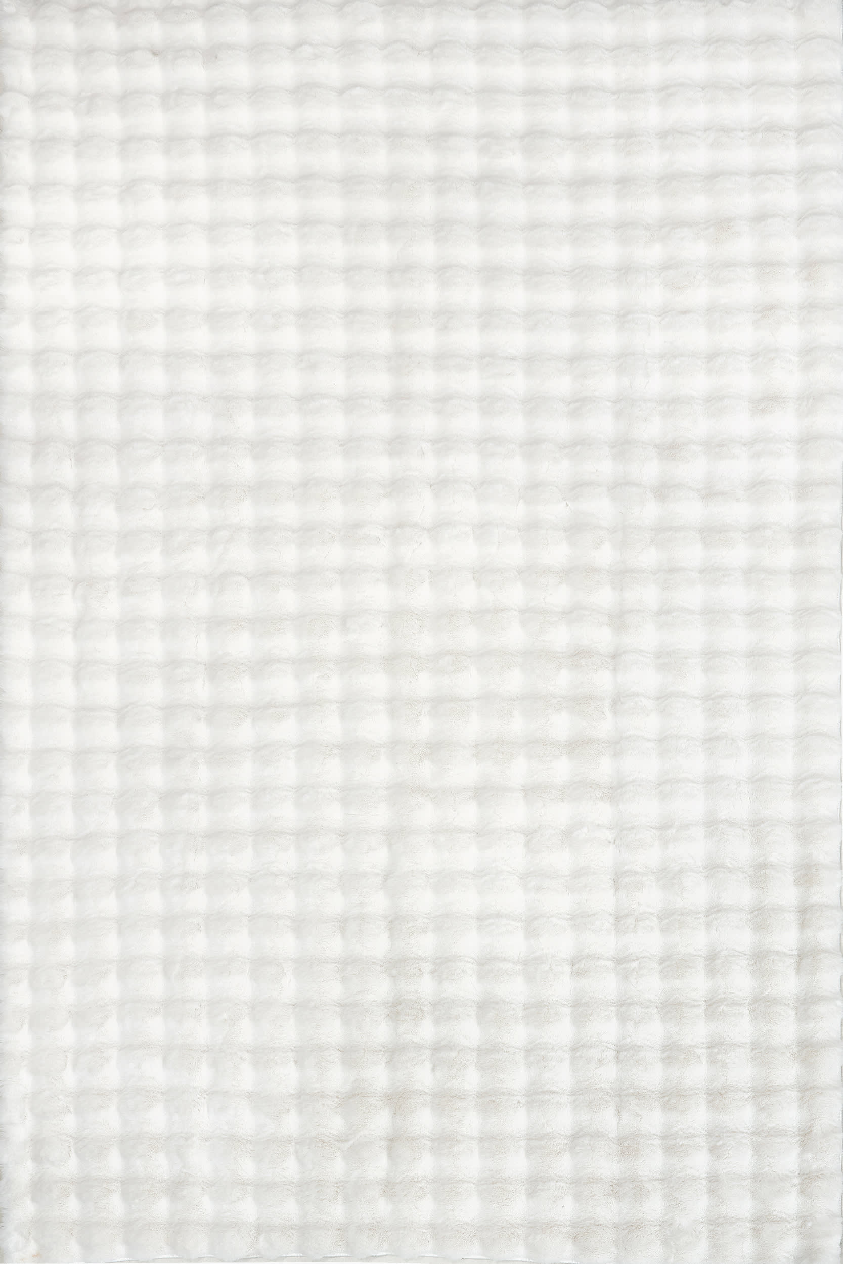 Isolated view of Off White Oval Ivana Checkered Plush Cloud Washable Rug, showcasing its design