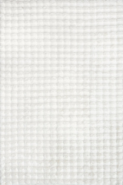 Isolated view of Off White Oval Ivana Checkered Plush Cloud Washable Rug, showcasing its design