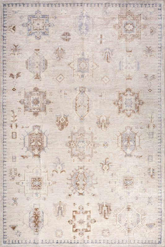 Isolated view of Beige Round Brenda Hazy Heraldry Spill Proof Washable Rug, showcasing its design
